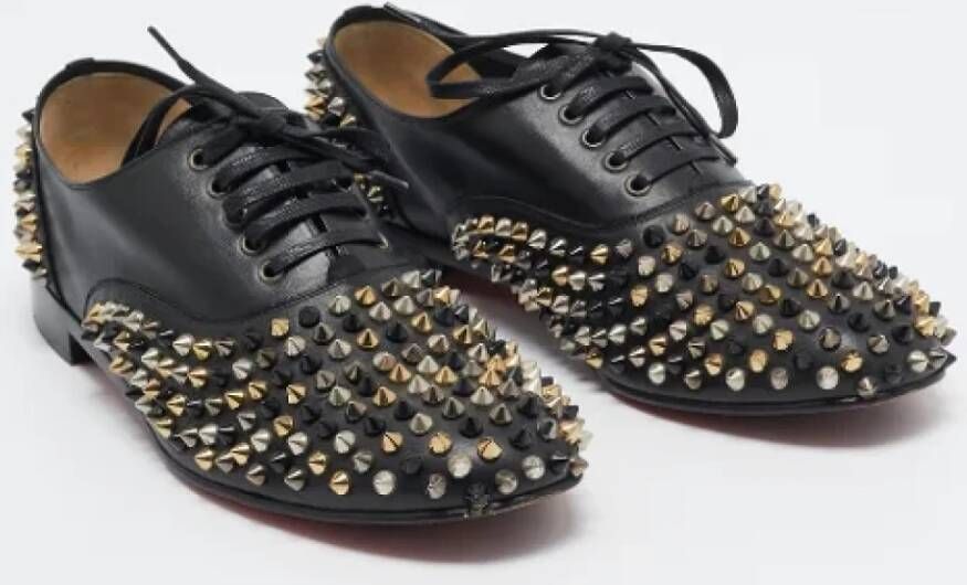 Christian Louboutin Pre-owned Leather flats Black Dames