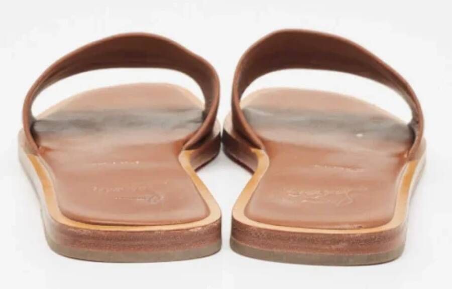 Christian Louboutin Pre-owned Leather flats Brown Dames