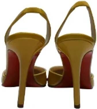 Christian Louboutin Pre-owned Leather heels Yellow Dames