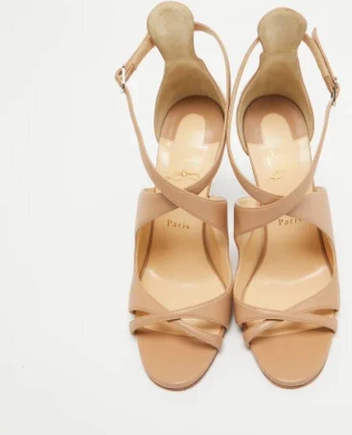 Christian Louboutin Pre-owned Leather sandals Beige Dames