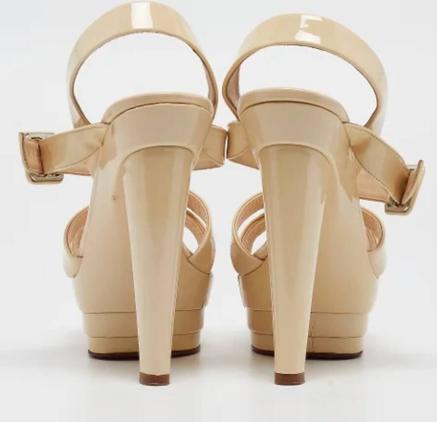 Christian Louboutin Pre-owned Leather sandals Beige Dames