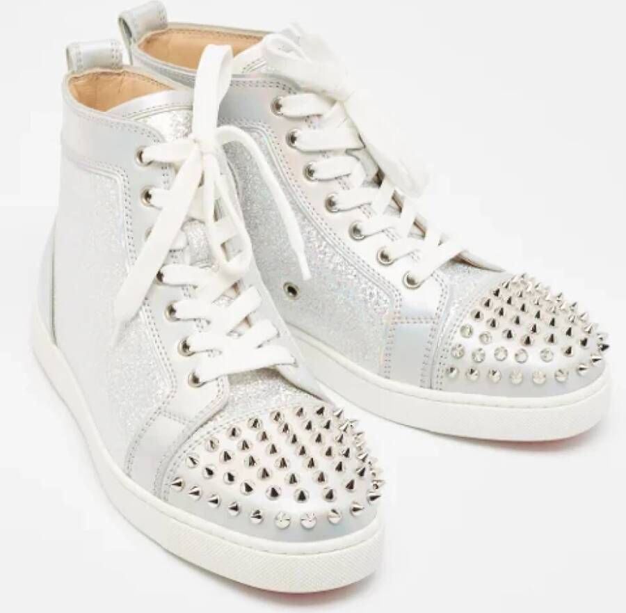 Christian Louboutin Pre-owned Leather sneakers Gray Dames