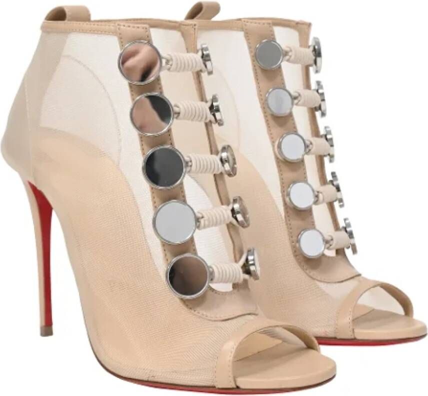 Christian Louboutin Pre-owned Polyester boots Beige Dames