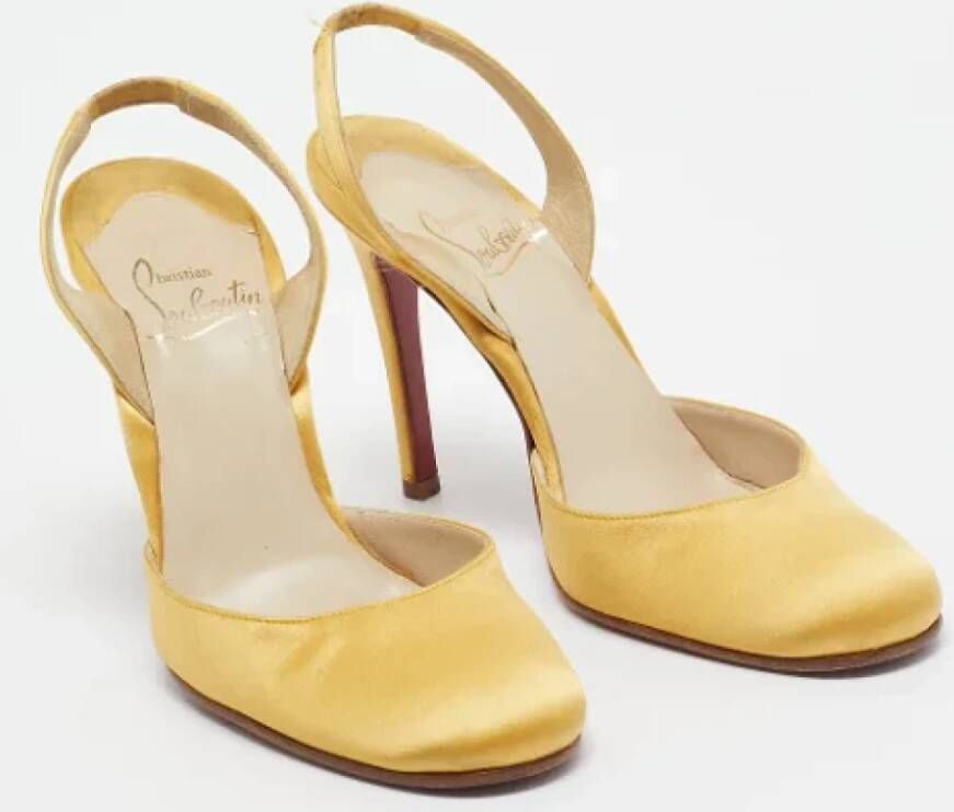 Christian Louboutin Pre-owned Satin heels Yellow Dames