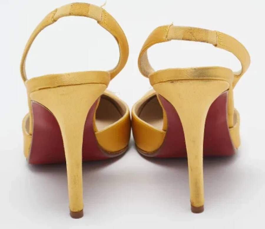 Christian Louboutin Pre-owned Satin heels Yellow Dames