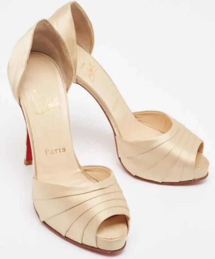 Christian Louboutin Pre-owned Satin heels Yellow Dames