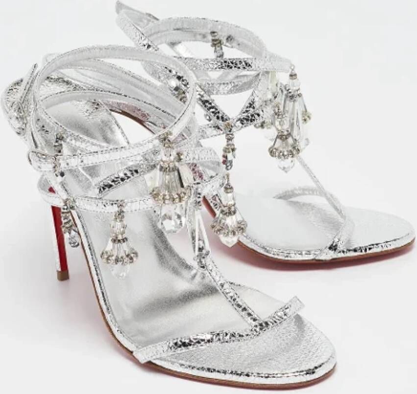 Christian Louboutin Pre-owned Silver sandals Gray Dames