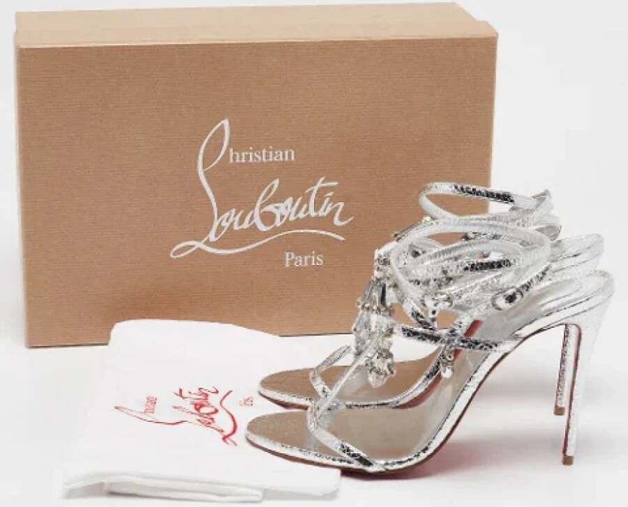 Christian Louboutin Pre-owned Silver sandals Gray Dames