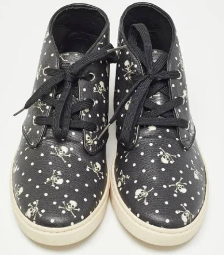 Dolce & Gabbana Pre-owned Coated canvas sneakers Black Heren