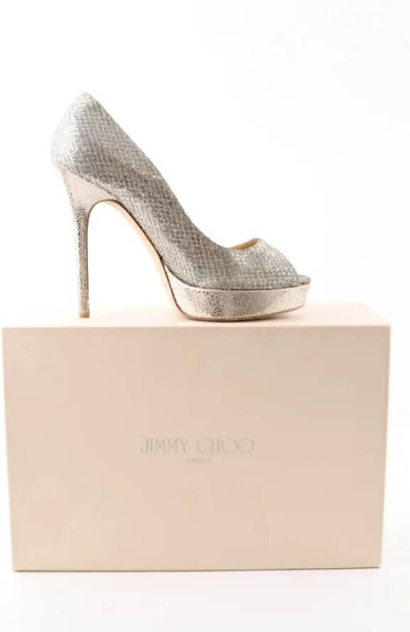 Jimmy Choo Pre-owned Canvas heels Yellow Dames