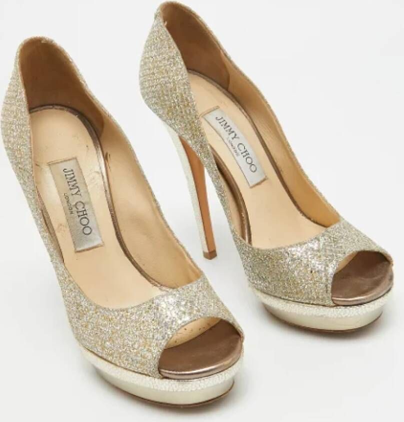 Jimmy Choo Pre-owned Fabric heels Yellow Dames