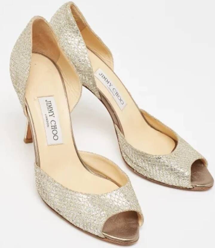 Jimmy Choo Pre-owned Fabric heels Yellow Dames