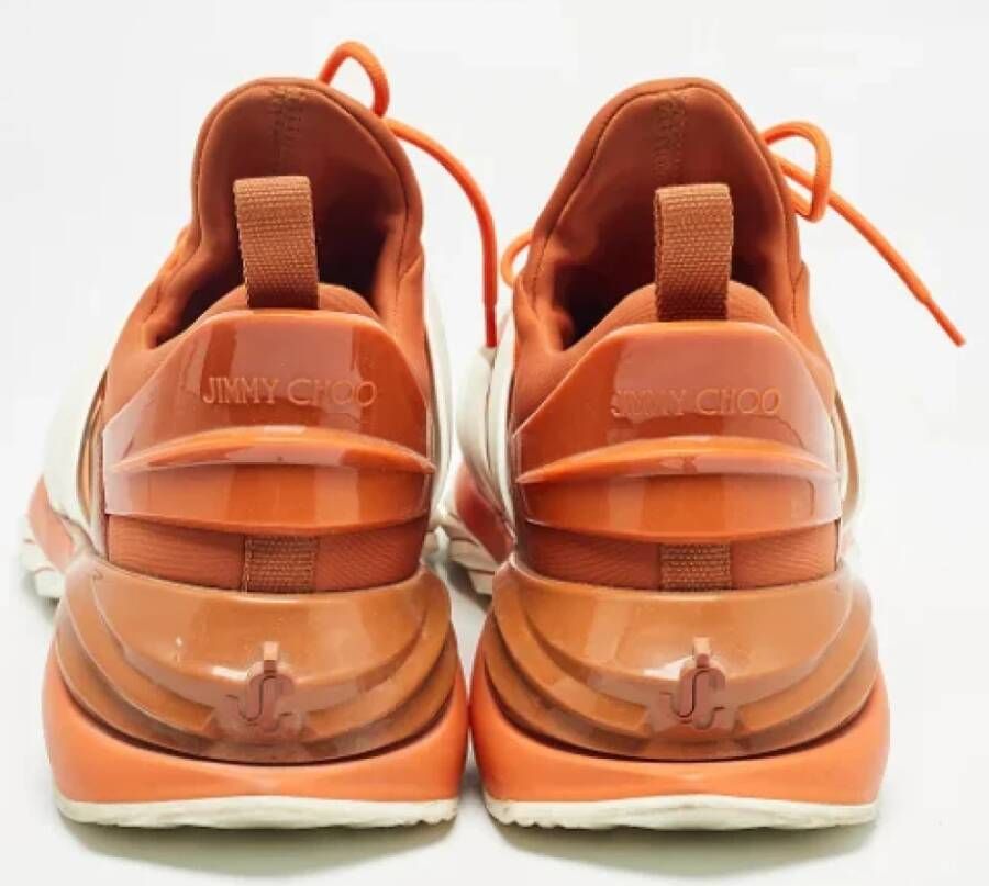 Jimmy Choo Pre-owned Fabric sneakers Orange Heren