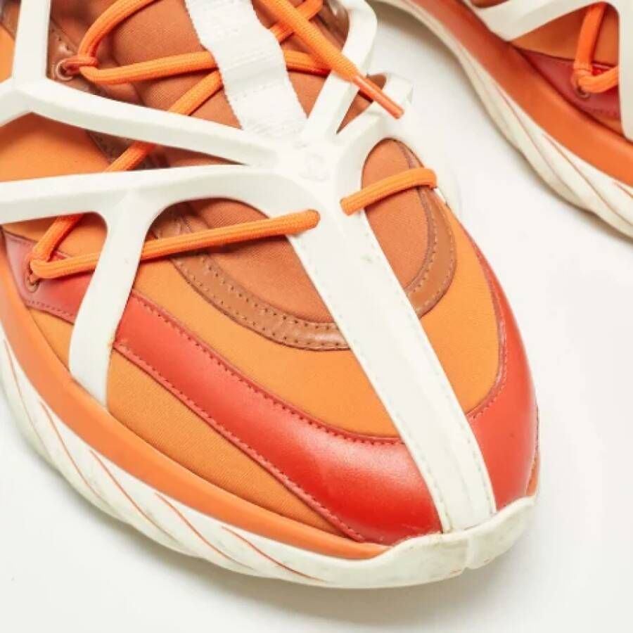 Jimmy Choo Pre-owned Fabric sneakers Orange Heren