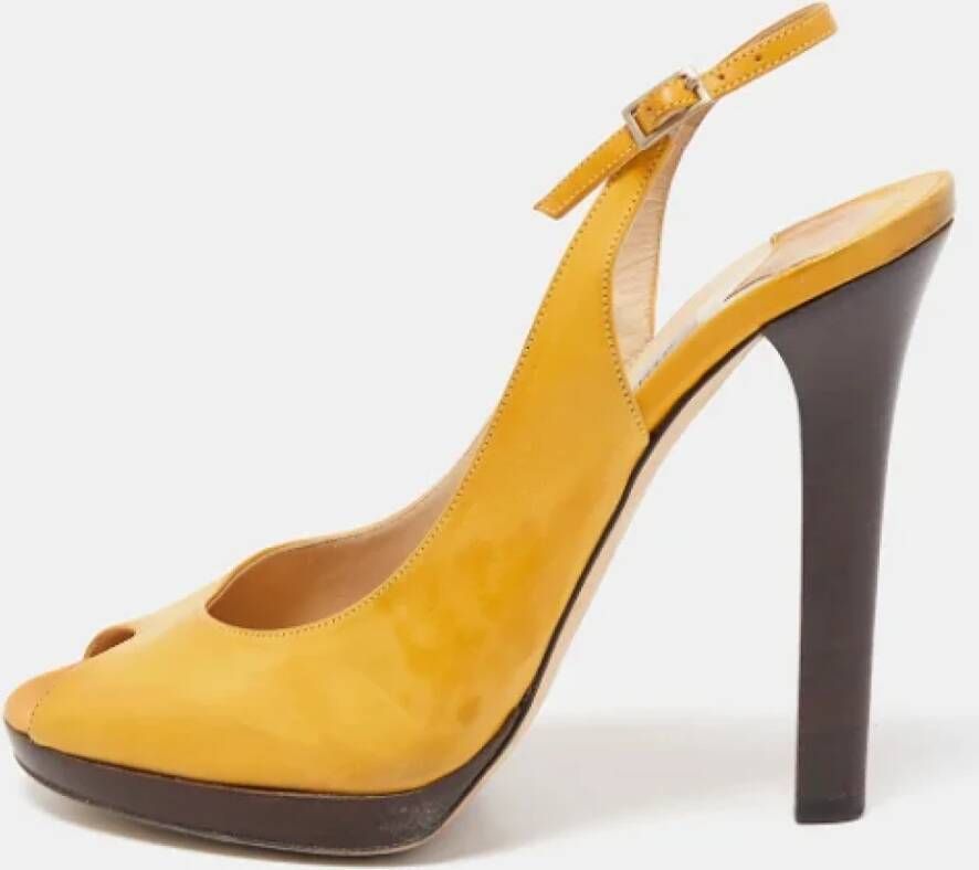 Jimmy Choo Pre-owned Leather heels Yellow Dames