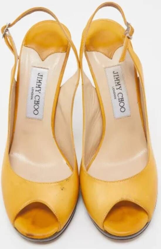 Jimmy Choo Pre-owned Leather heels Yellow Dames