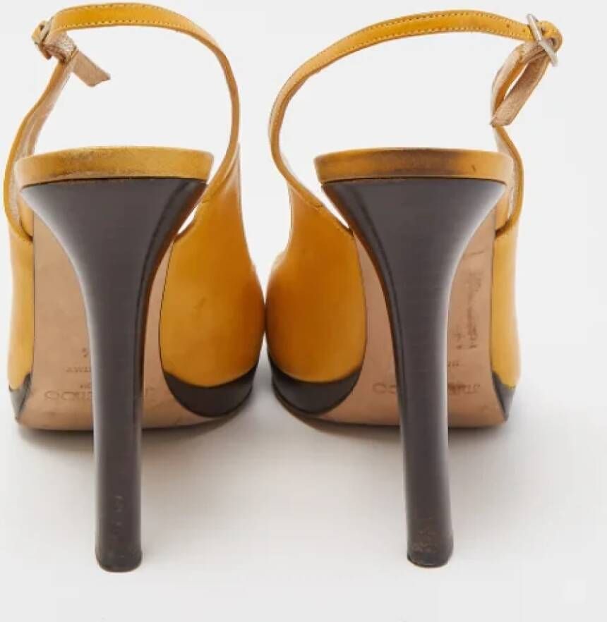 Jimmy Choo Pre-owned Leather heels Yellow Dames