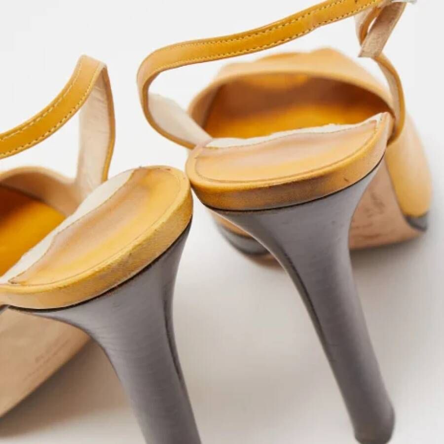 Jimmy Choo Pre-owned Leather heels Yellow Dames