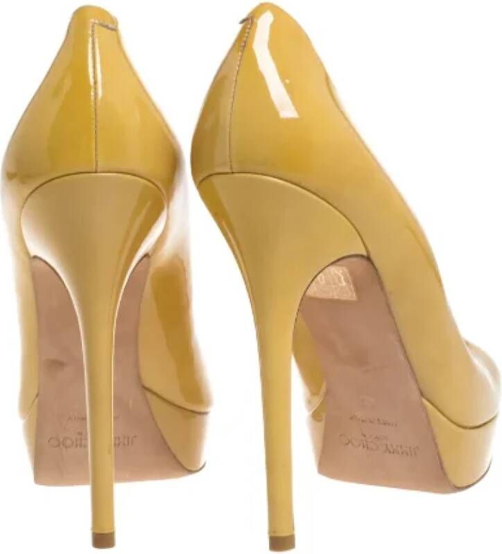 Jimmy Choo Pre-owned Leather heels Yellow Dames