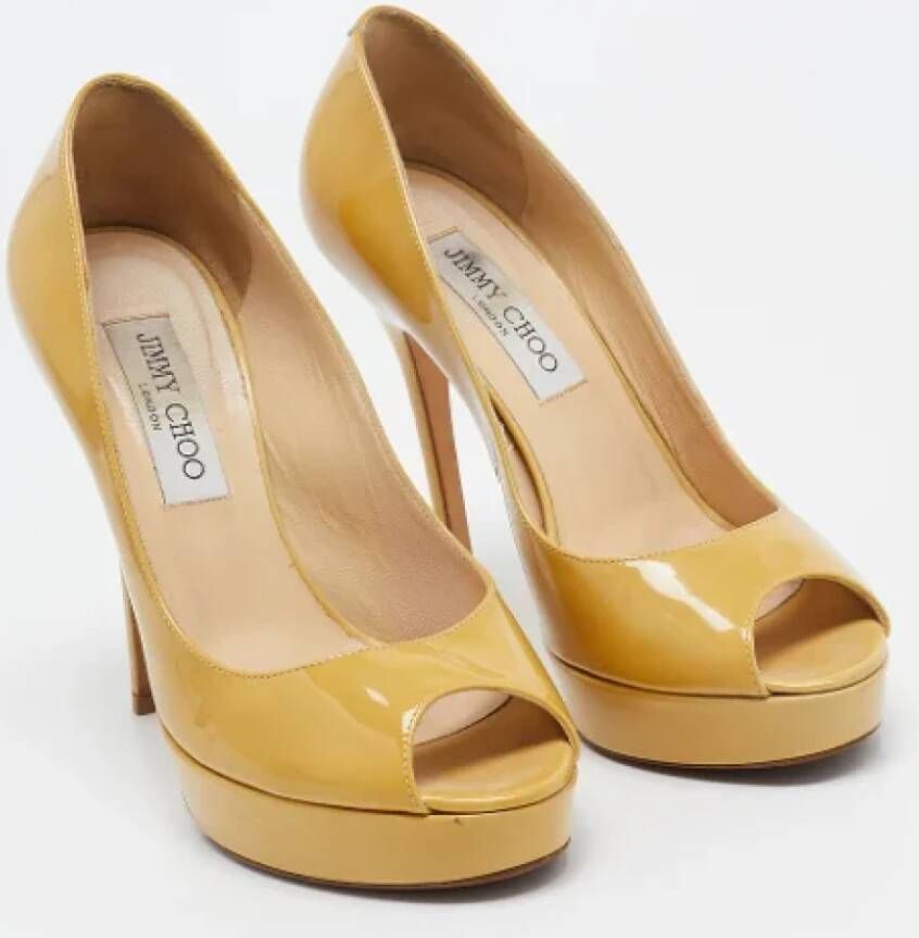 Jimmy Choo Pre-owned Leather heels Yellow Dames