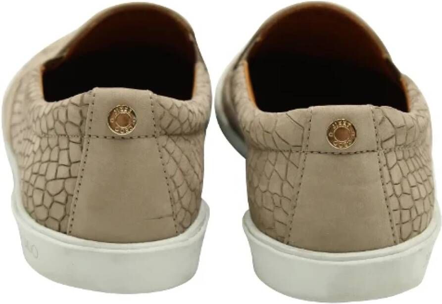 Jimmy Choo Pre-owned Leather sneakers Beige Dames