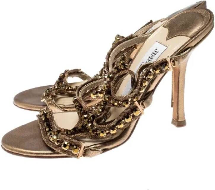 Jimmy Choo Pre-owned Metal sandals Gray Dames