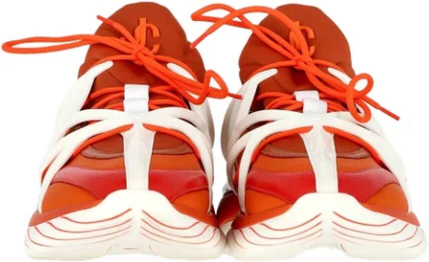 Jimmy Choo Pre-owned Rubber sneakers Orange Heren