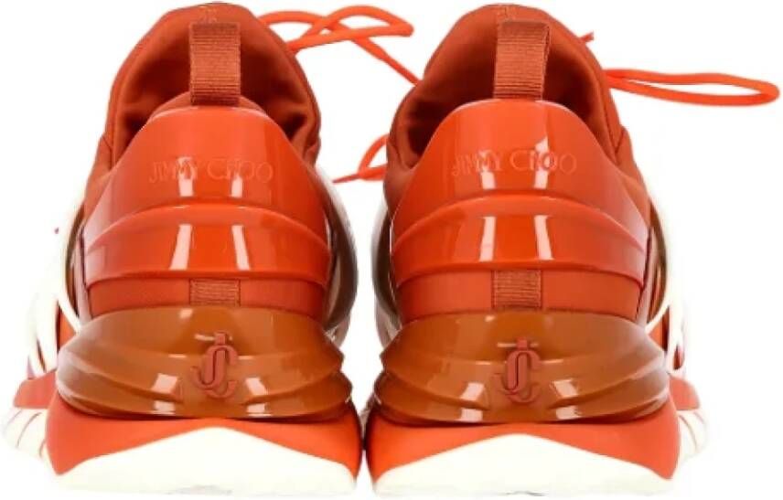 Jimmy Choo Pre-owned Rubber sneakers Orange Heren