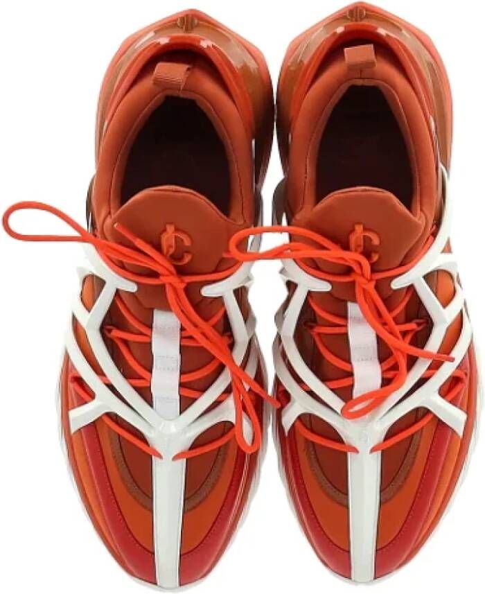 Jimmy Choo Pre-owned Rubber sneakers Orange Heren