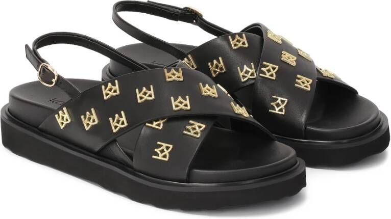 Kazar Platte sandalen versierd met metalen monogrammen Black Dames