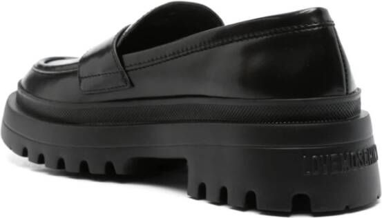 Love Moschino Zwarte platte schoenen met reliëflogo Black Dames