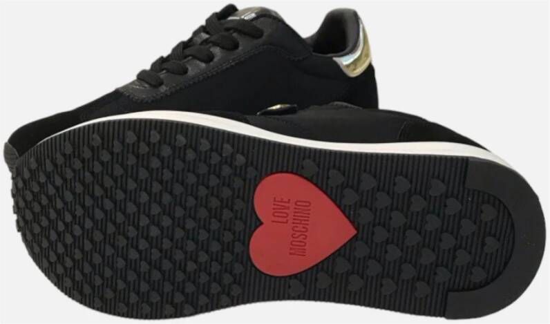 Love Moschino Zwarte platte sneakers met suède details Black Dames