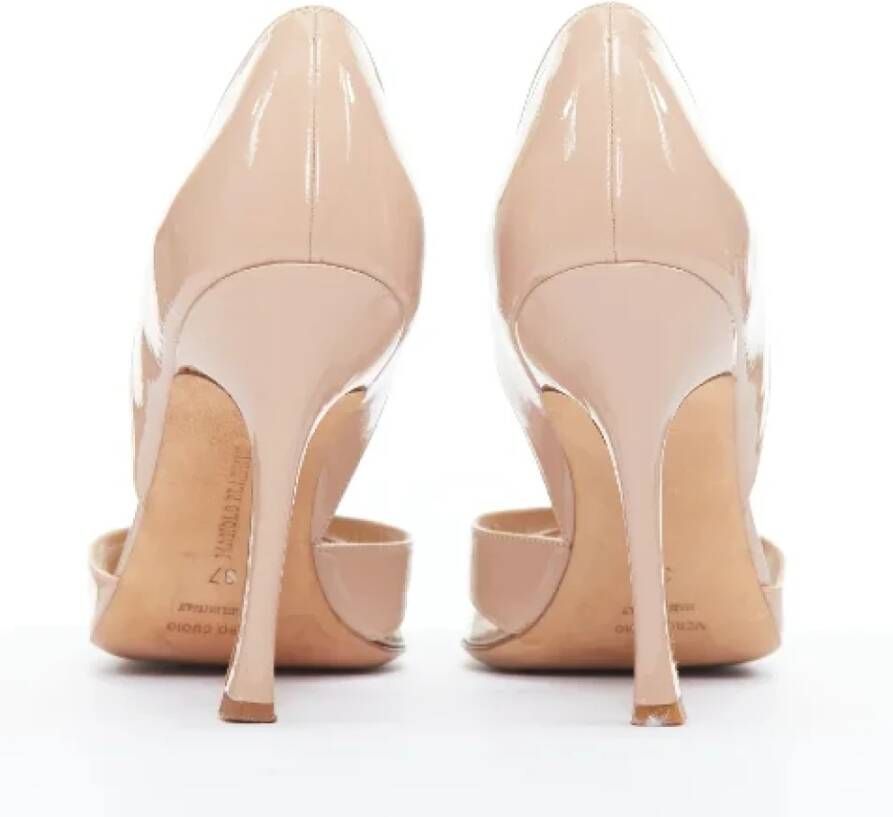 Manolo Blahnik Pre-owned Leather heels Beige Dames