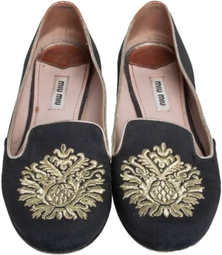 Miu Pre-owned Canvas flats Black Dames