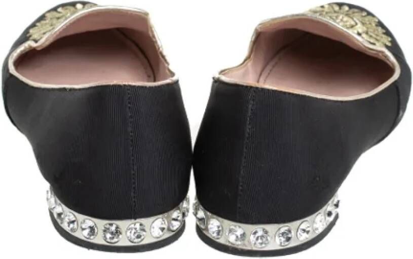 Miu Pre-owned Canvas flats Black Dames