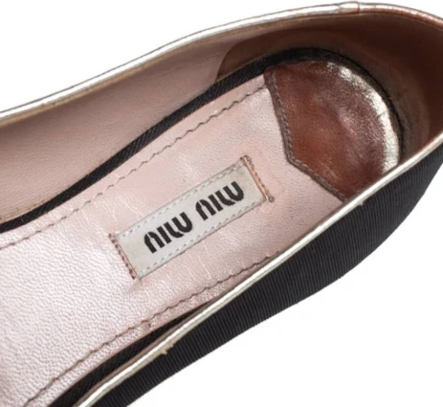 Miu Pre-owned Canvas flats Black Dames