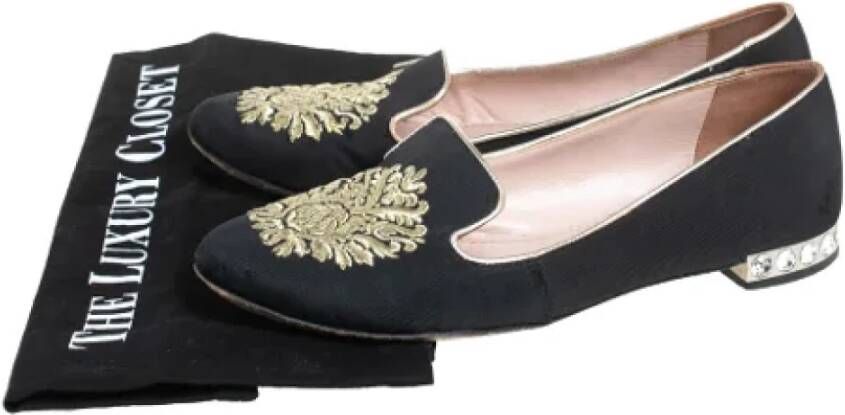 Miu Pre-owned Canvas flats Black Dames