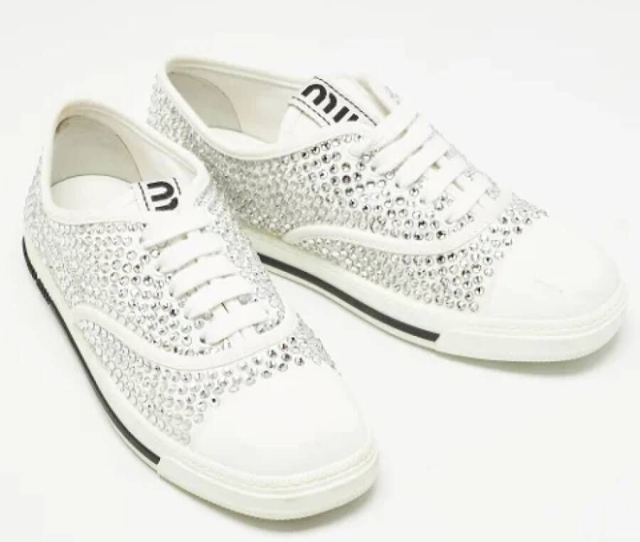 Miu Pre-owned Canvas sneakers White Dames