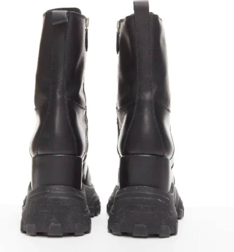 Miu Pre-owned Fabric boots Black Dames