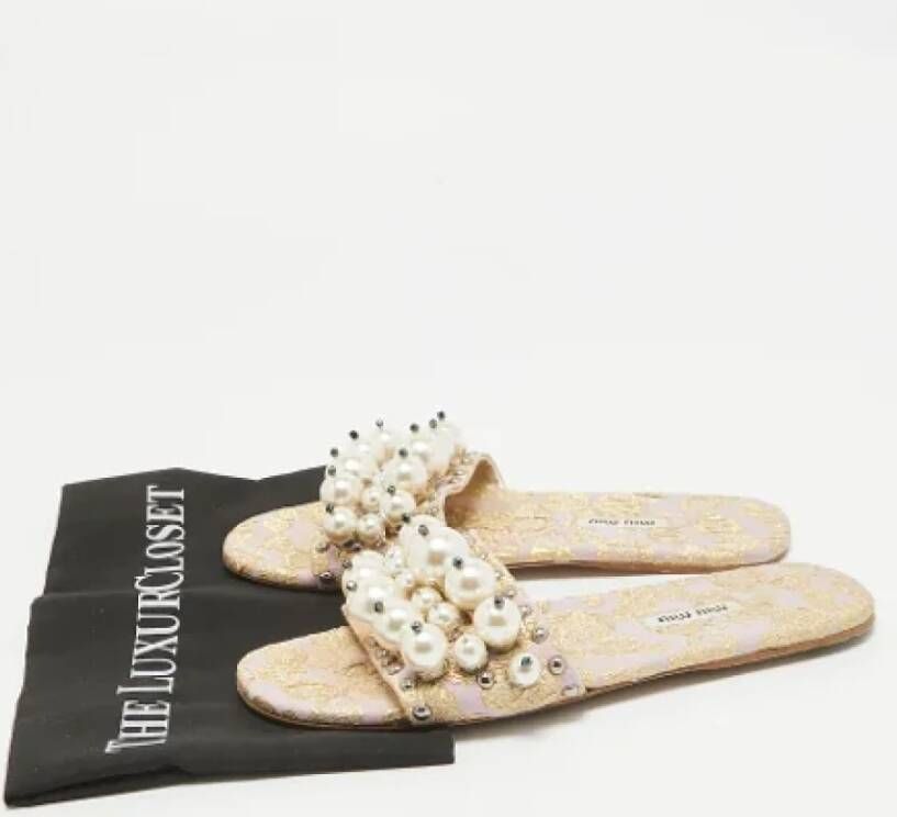 Miu Pre-owned Fabric flats Beige Dames