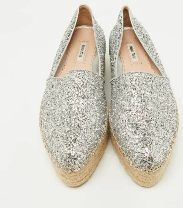 Miu Pre-owned Fabric flats Gray Dames