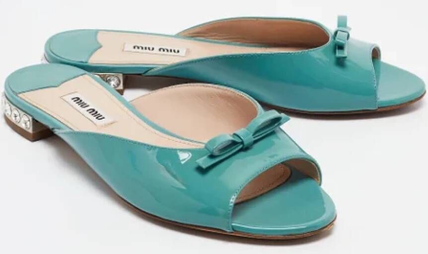 Miu Pre-owned Fabric flats Green Dames