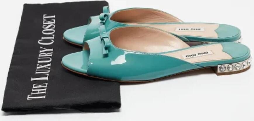 Miu Pre-owned Fabric flats Green Dames