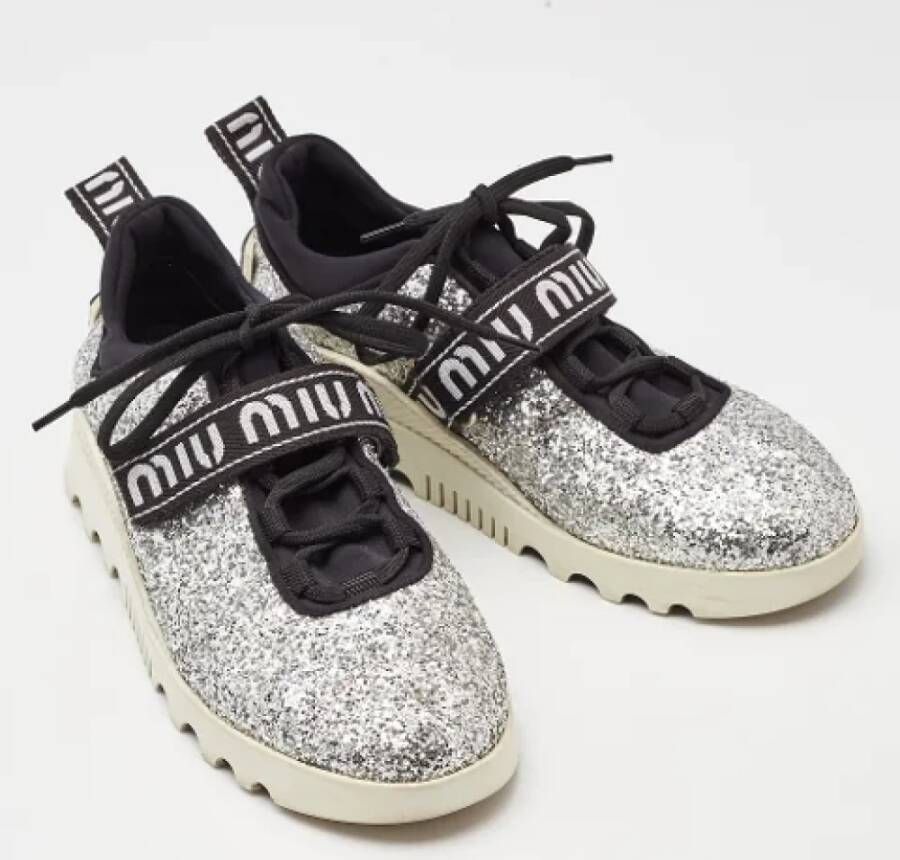 Miu Pre-owned Fabric sneakers Gray Dames