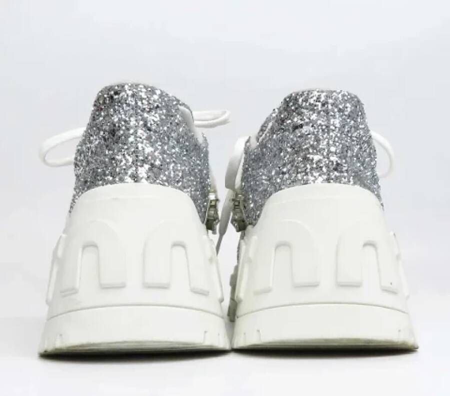 Miu Pre-owned Fabric sneakers White Dames