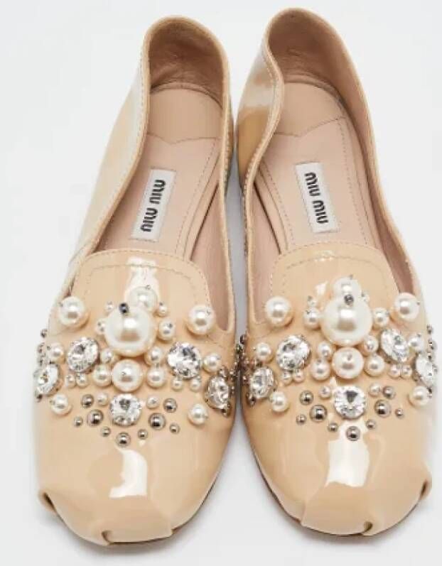 Miu Pre-owned Leather flats Beige Dames