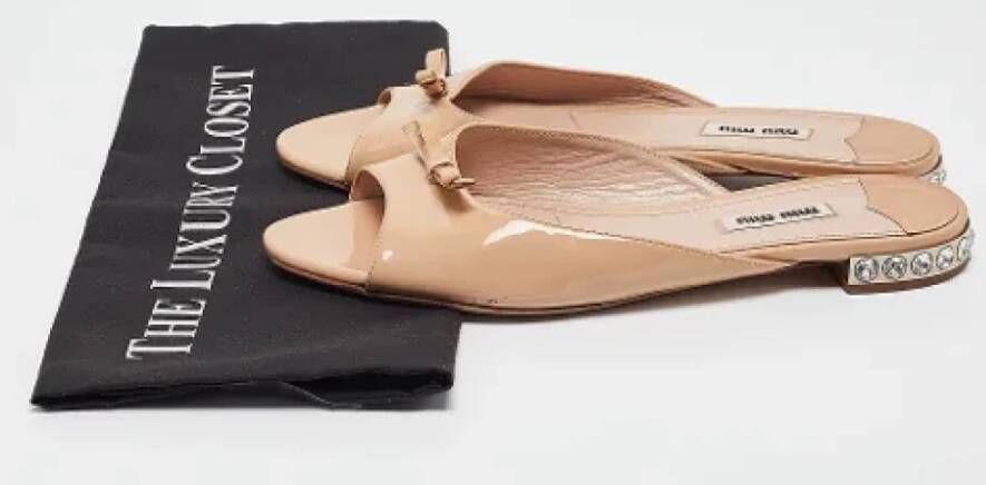 Miu Pre-owned Leather flats Beige Dames