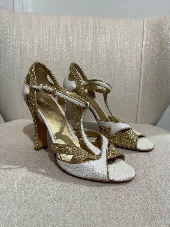 Miu Pre-owned Leather sandals Yellow Dames