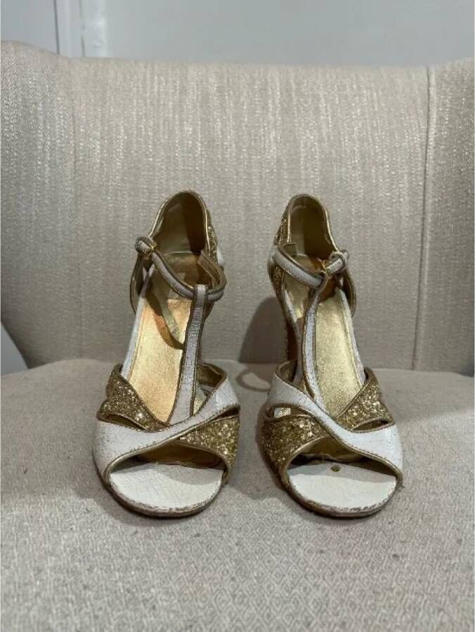 Miu Pre-owned Leather sandals Yellow Dames