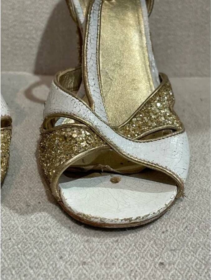 Miu Pre-owned Leather sandals Yellow Dames